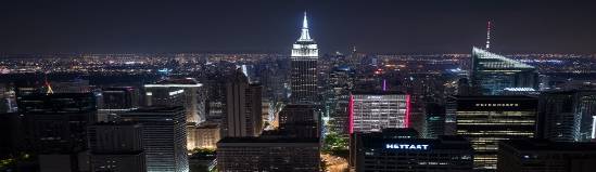 driven mission purpose, visionary expression, planning, photorealistic, bustling urban background with street life, highly detailed, moving traffic and pedestrians, absolute precision, rich saturation, twilight ambiance, shot with a fisheye lens.